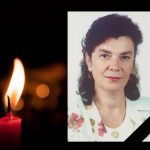 свічка, фото жінки з траурною стрічкою